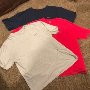 THREE men’s Reebok tee shirts